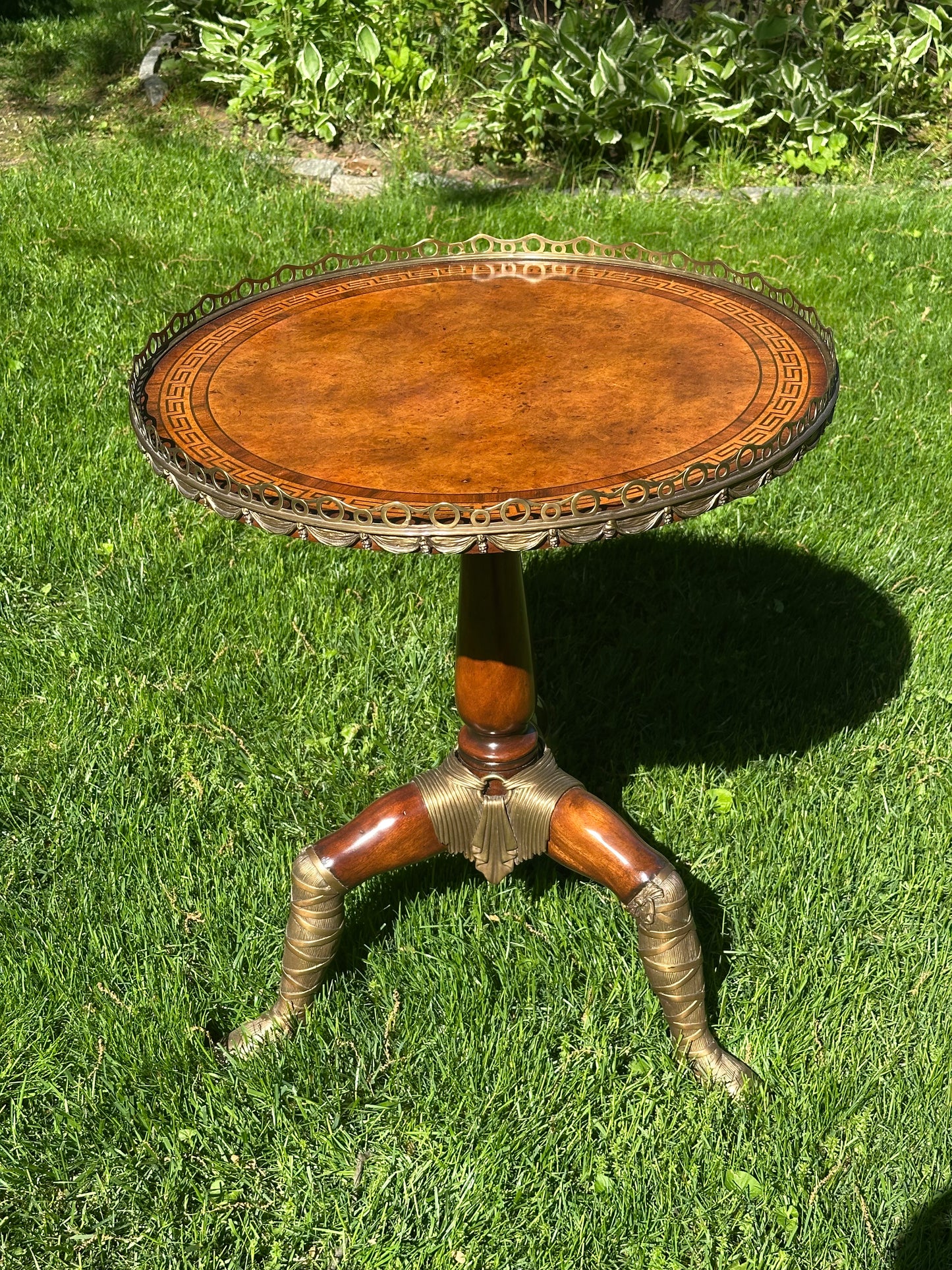 Theodore Alexander Walnut Circular “Isle of Man” Table on Tripod Base.