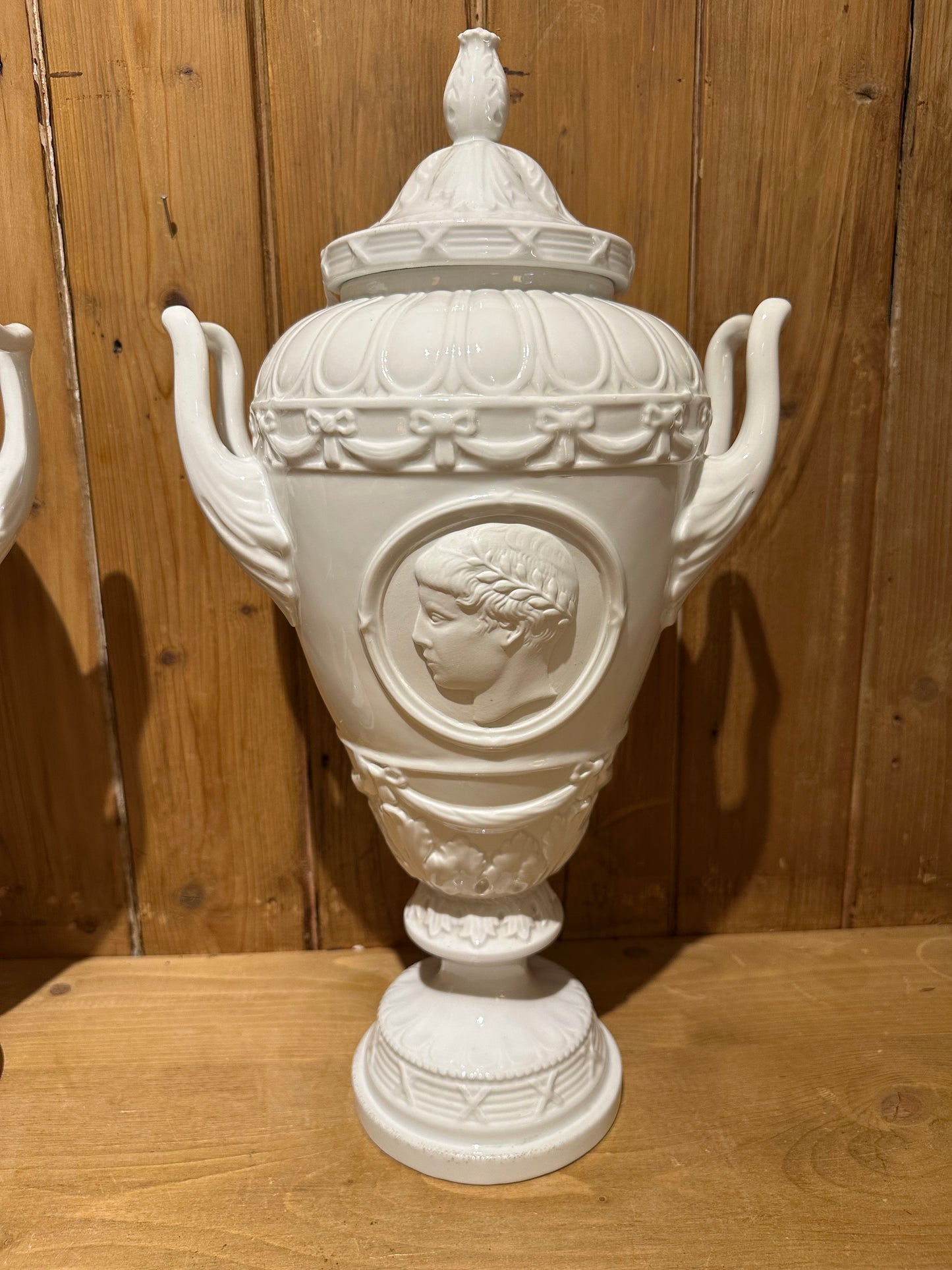 Pair of White Glazed Italian Neo Classical Covered Urns