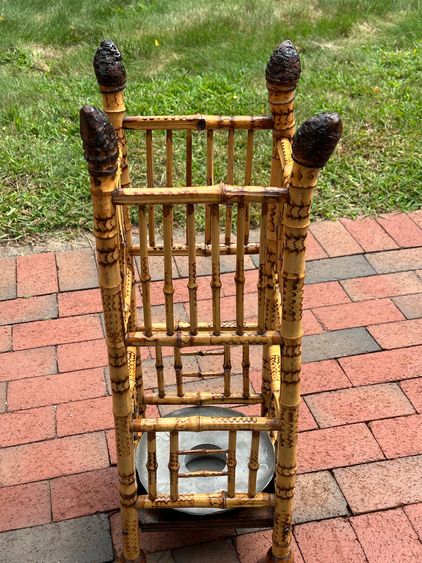 Late 19th Century Bamboo Umbrella stand with insert. Burned decoration on bamboo. Circa 1885.