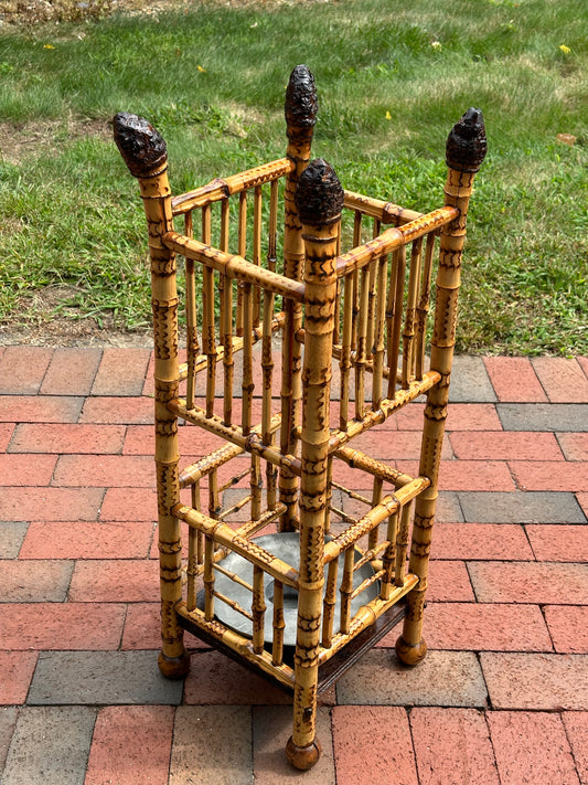 Late 19th Century Bamboo Umbrella stand with insert. Burned decoration on bamboo. Circa 1885.