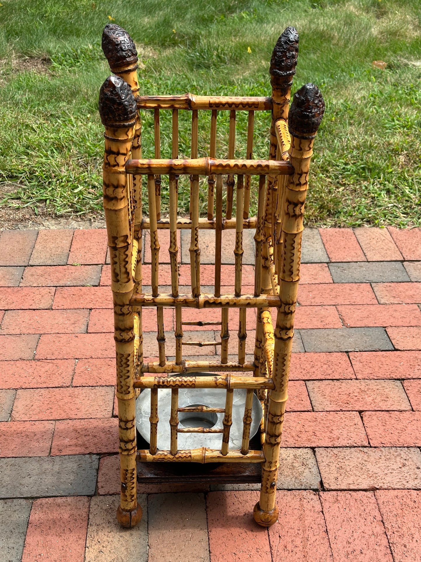 Late 19th Century Bamboo Umbrella stand with insert. Burned decoration on bamboo. Circa 1885.